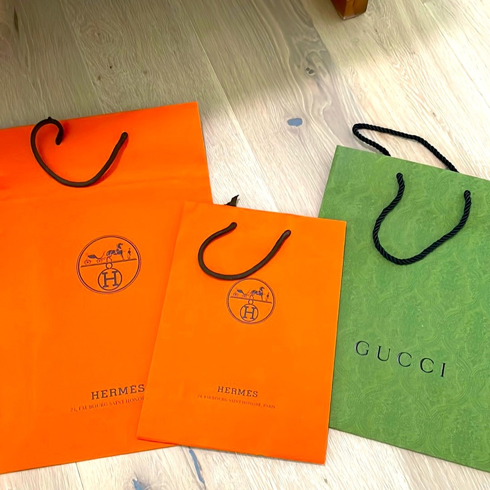 Gucci and Hermes shopping bags